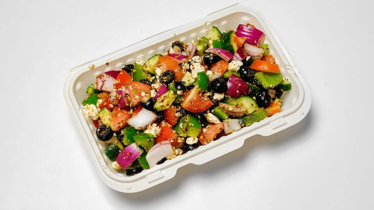 Indian fusion pizza ingredients at Pizza 64 Winnipeg